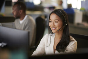 Claims advocate at OCS negotiates with insurance adjuster on behalf of a restoration contractor