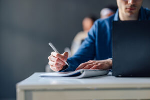 A restoration contractor takes an examination to get restoration certifications