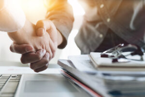 business partnership shakes hands