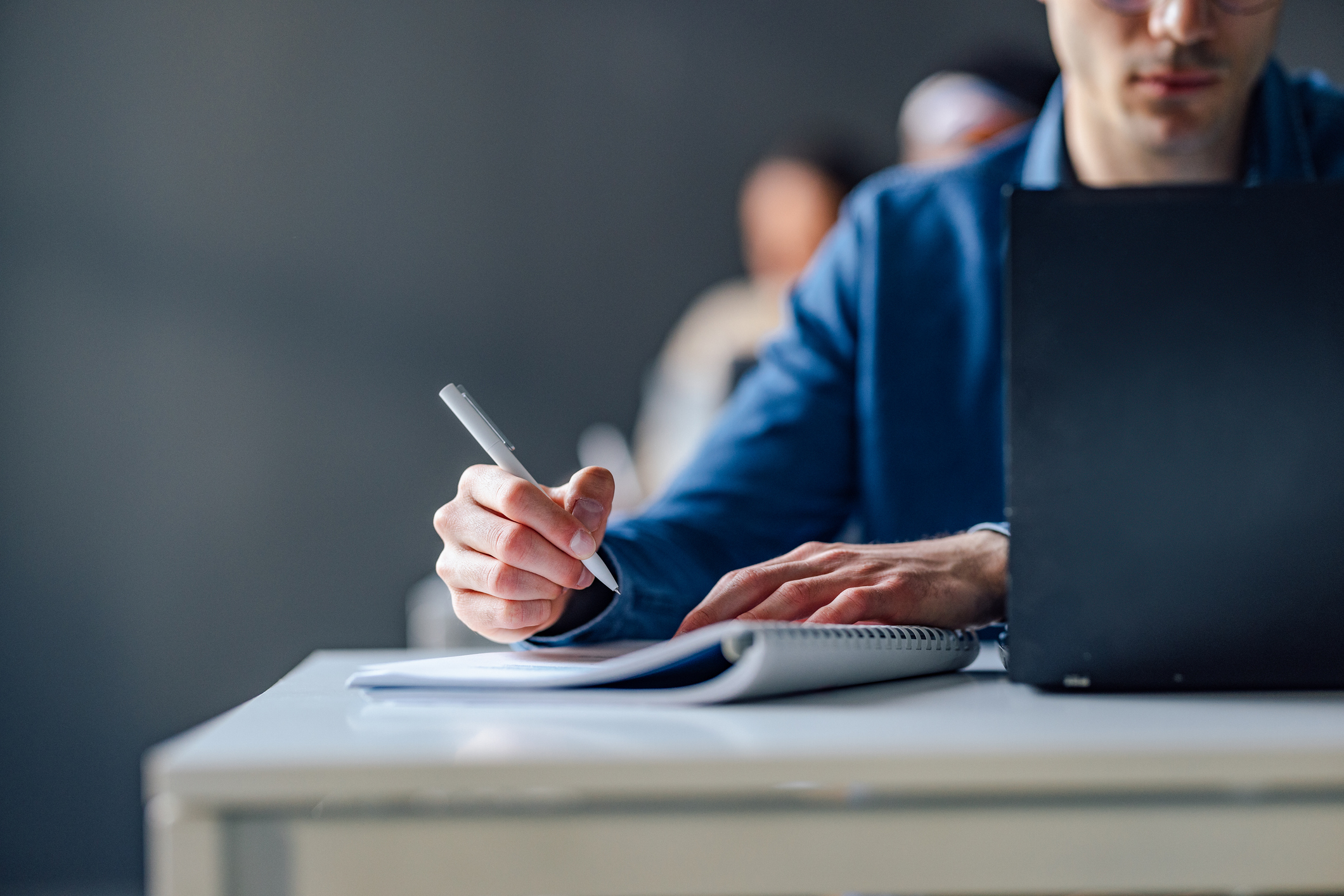 A restoration contractor takes an examination to get restoration certifications